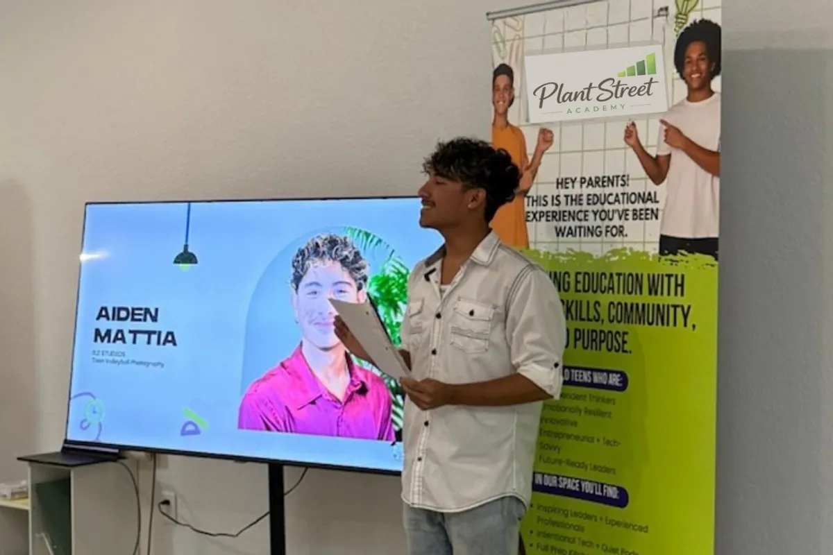 Aiden Mattia pitching his business model at graduation